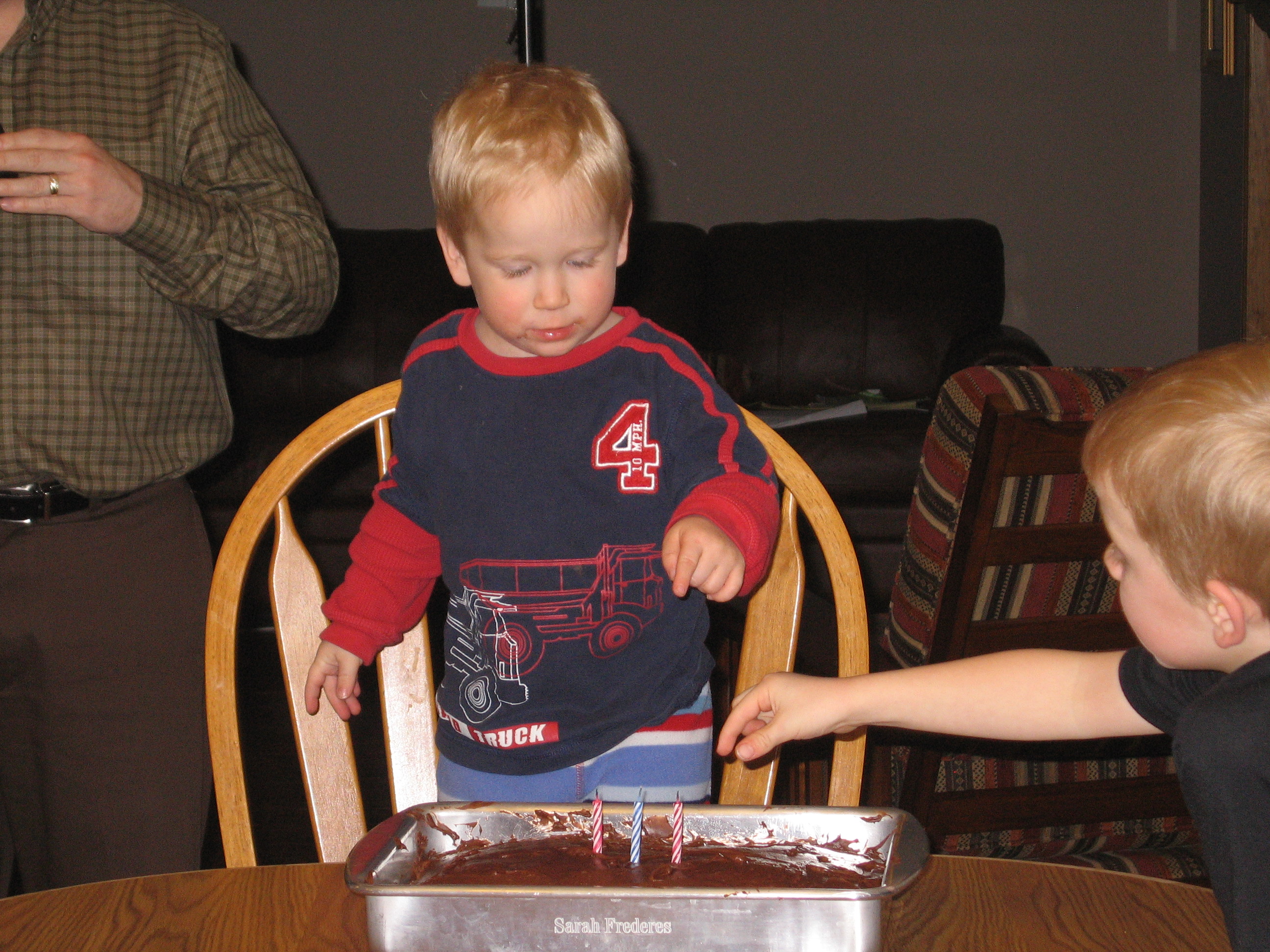 Pointing at the Cake