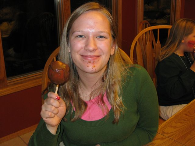 When we got home, everybody dived into their candy. Maria didn't like caramel apples, so she gave hers to me.